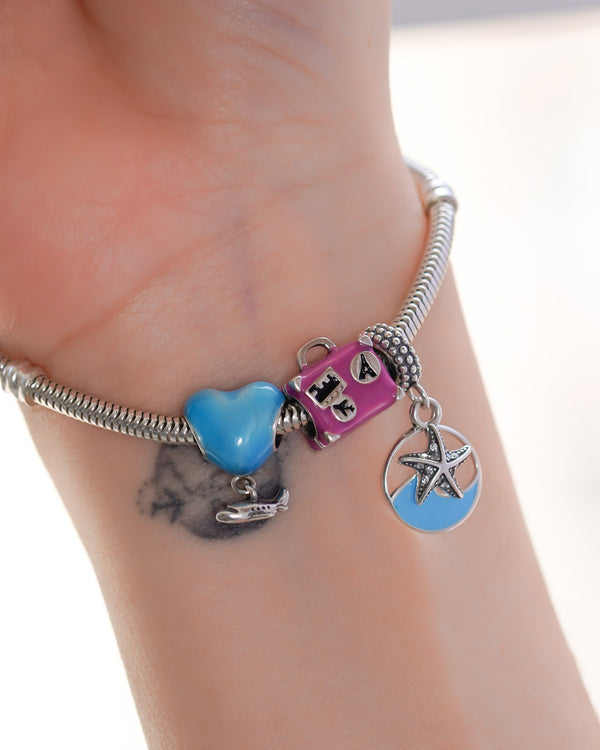 COMBO PASAPORTE A LA PLAYA (CHARMS + BRAZALETE)